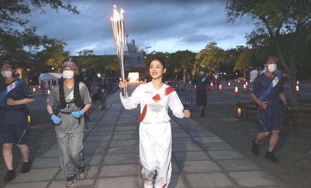 奥运火炬传交日本(日本奥运会火炬传递手)